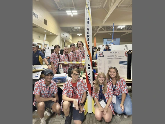 University of Arizona AIAA club members display their rocket ‘Fire Hazard’ at the 2024 Spaceport America Cup.