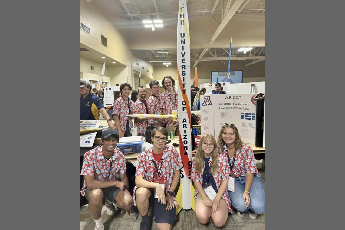 University of Arizona AIAA club members display their rocket ‘Fire Hazard’ at the 2024 Spaceport America Cup.